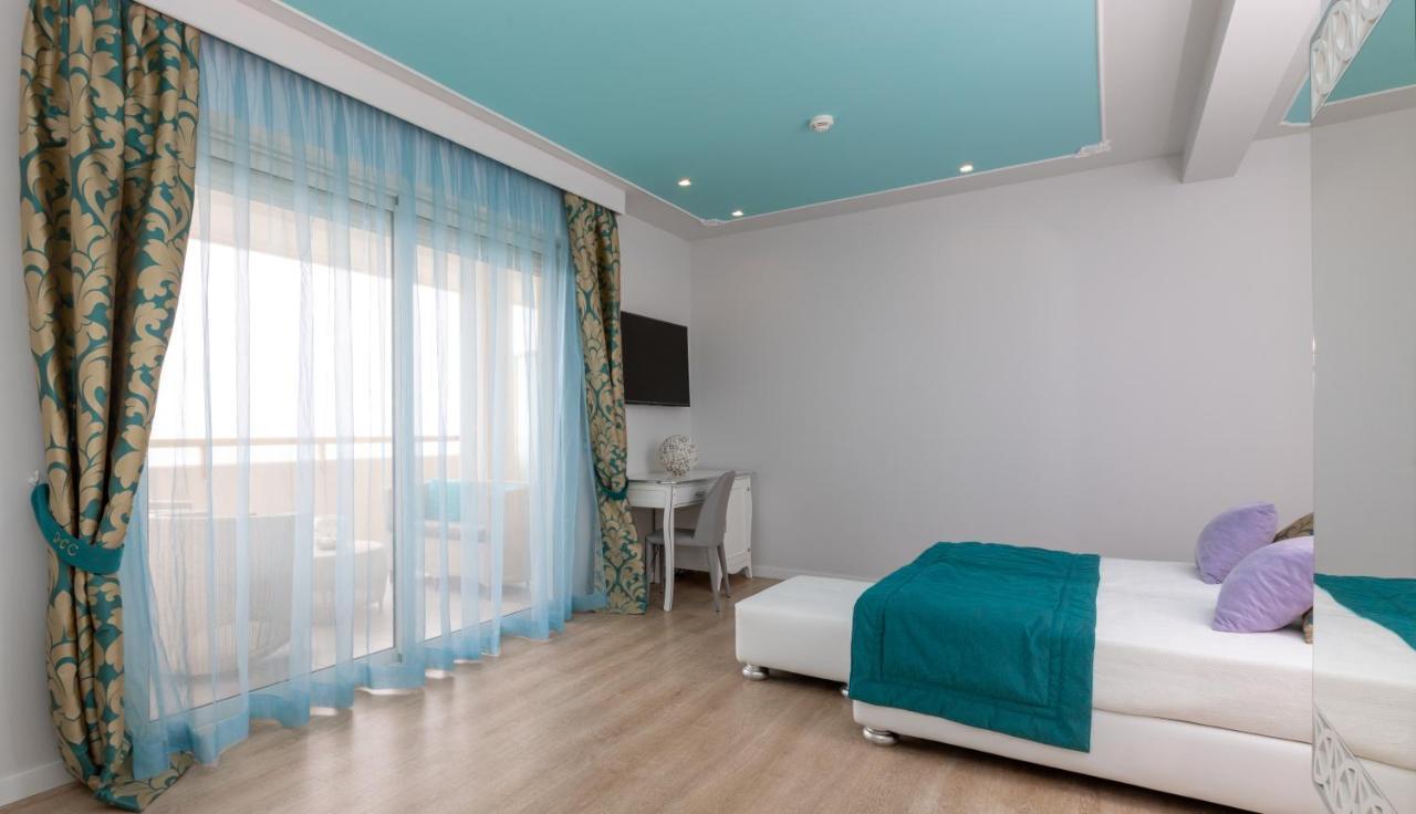 Junior Suite with Balcony Side Sea View,1001362779:JPEG