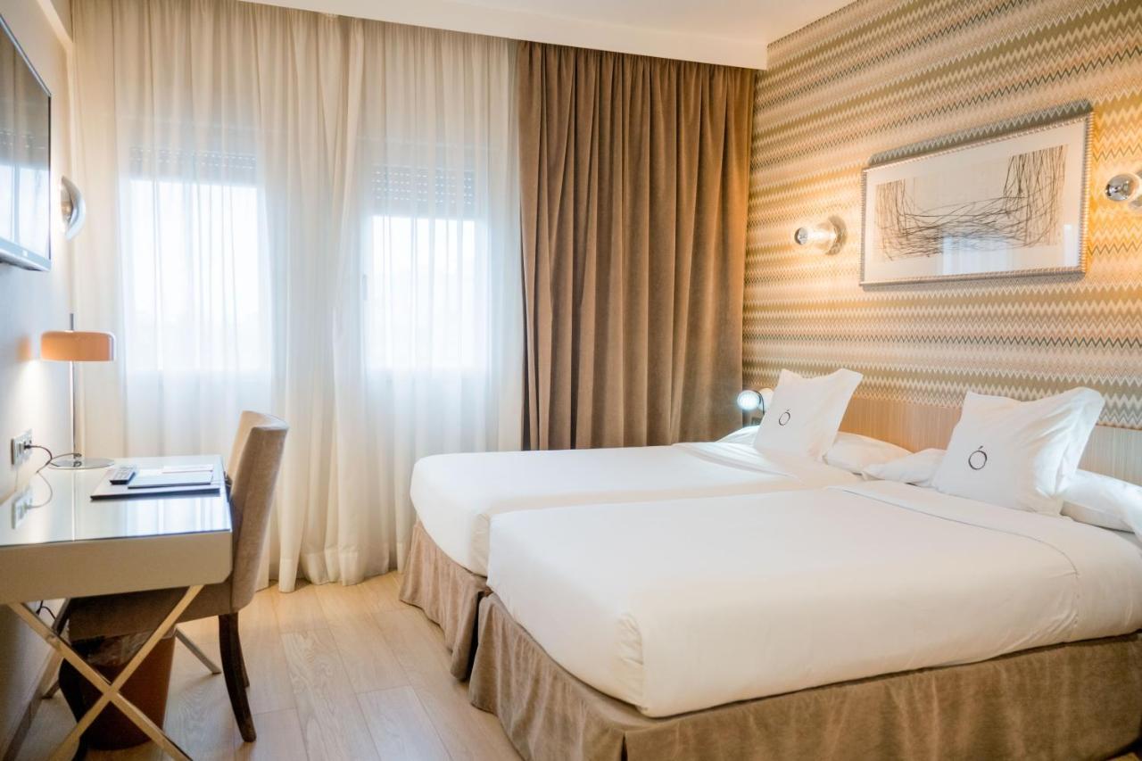 Tweepersoonskamer met 1 of 2 Bedden en een Extra Bed