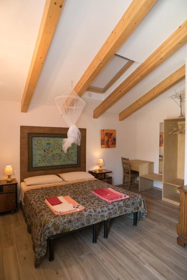 Chambre Quadruple avec Salle de Bains Privative