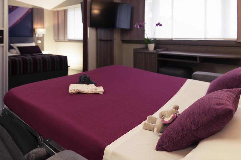 Suite met 1 Tweepersoonsbed en Slaapbank