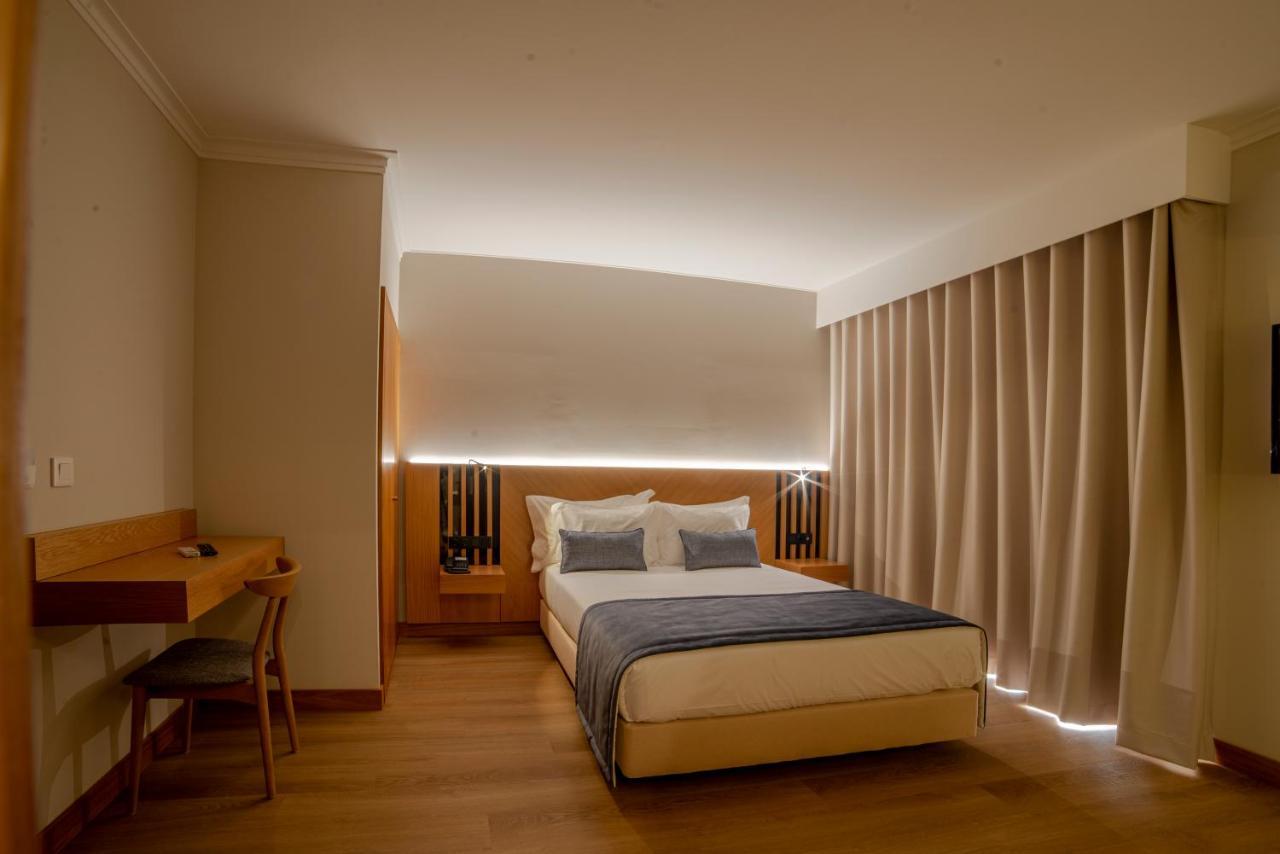 Quarto Duplo com Cama Extra (3 Adultos)