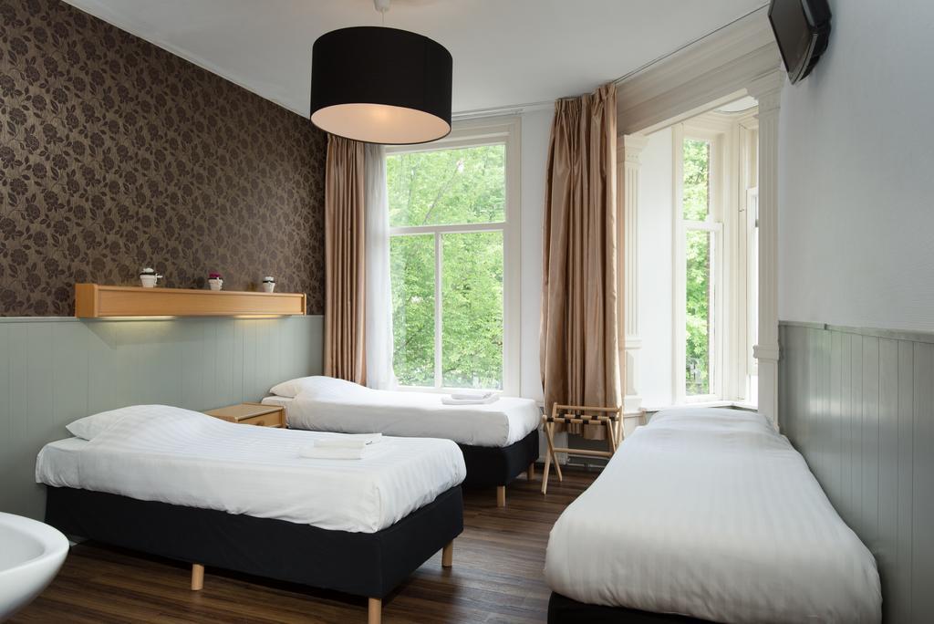 Chambre Triple - Vue sur Canal