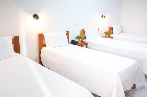 Quarto Triplo Executivo