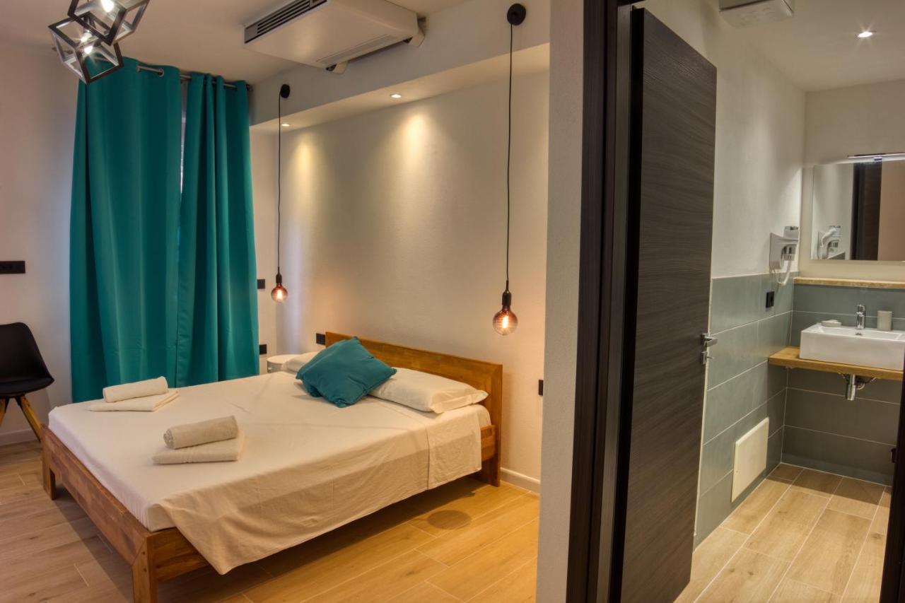Chambre Triple avec Terrasse