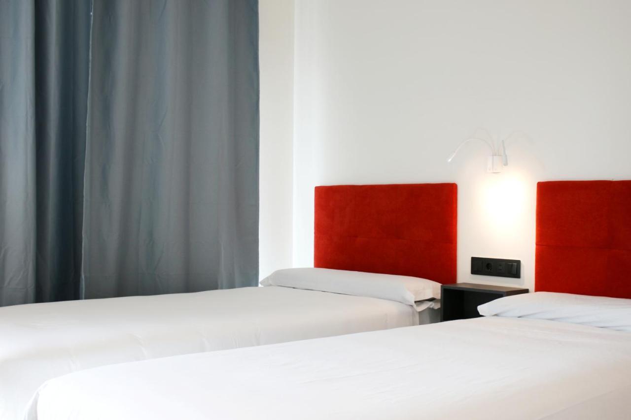 Quarto com 2 Camas de Solteiro
