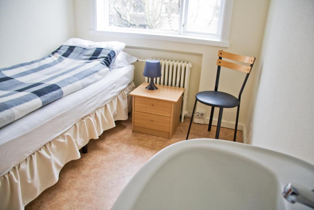 Camera Singola con Bagno in Comune