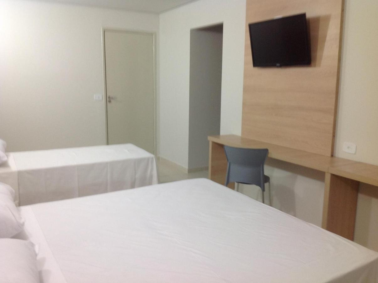 Quarto Triplo Executivo