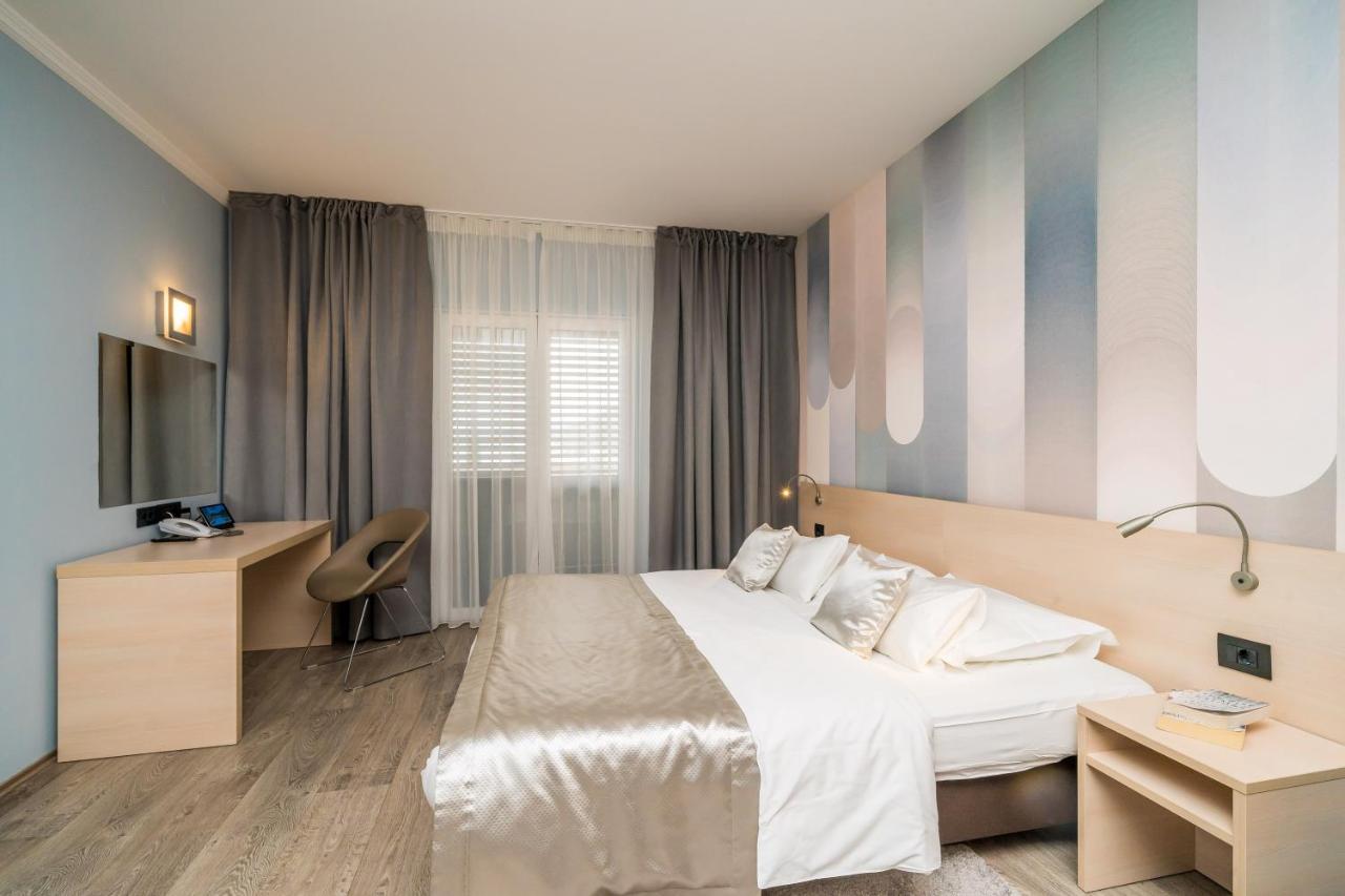 Tweepersoonskamer met 1 of 2 Bedden en Balkon
