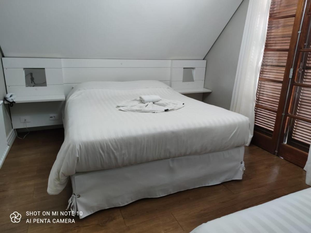 Quarto Triplo com Varanda