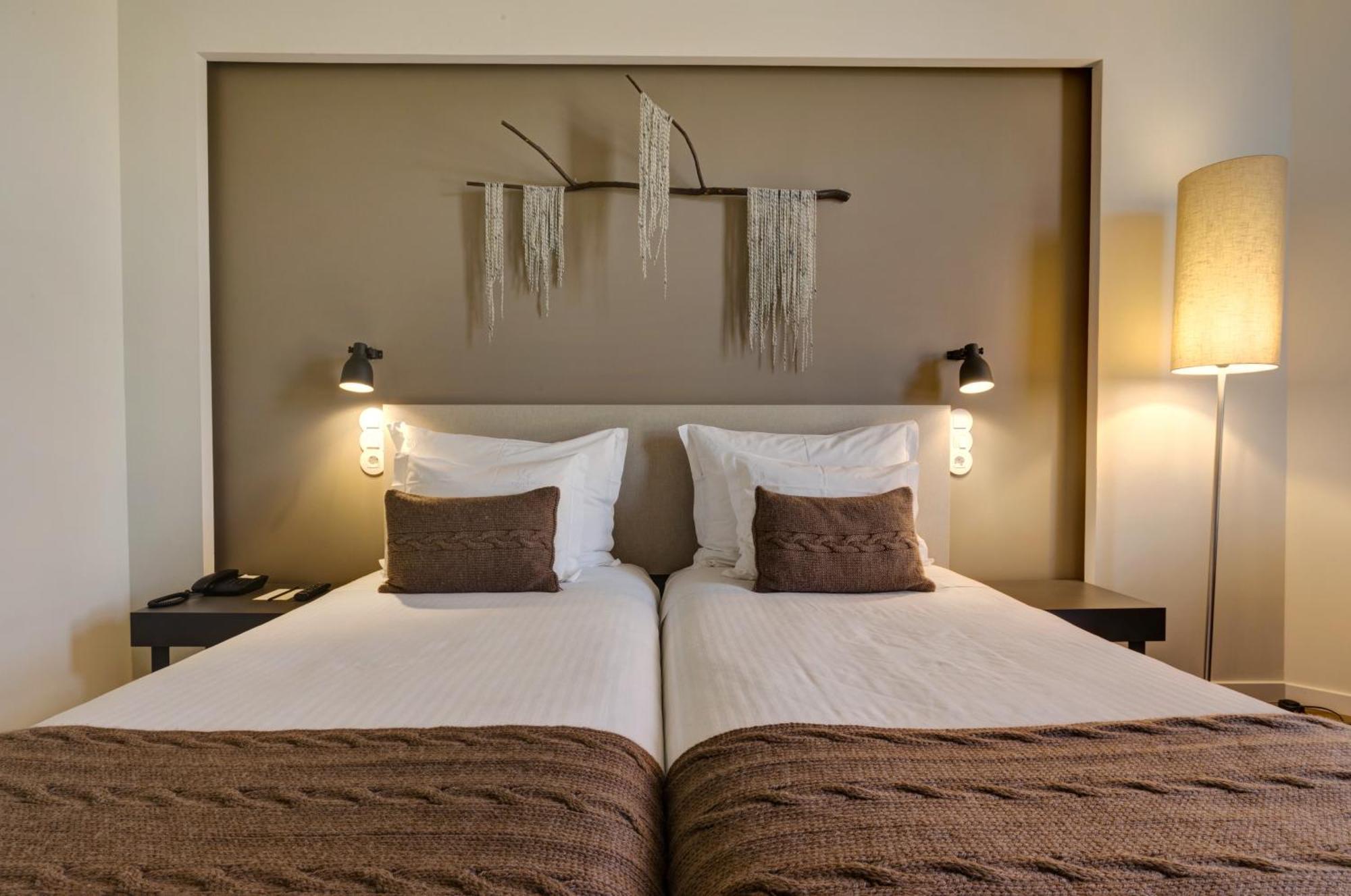 Quarto Twin com Cama Extra (2 Adultos + 1 Criança)