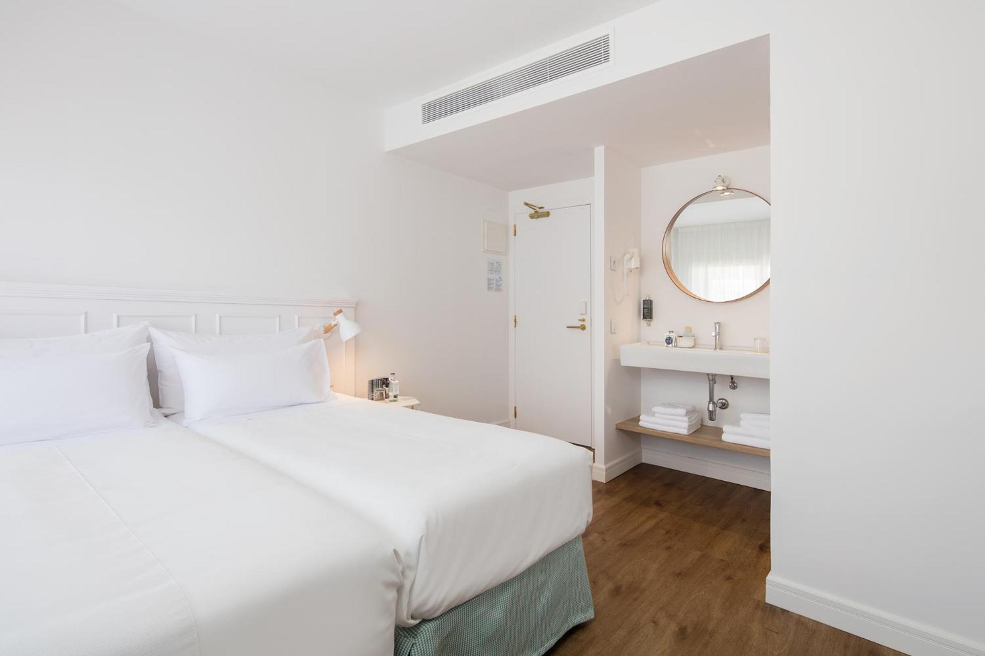 Habitación Doble con cama supletoria (3 adultos)