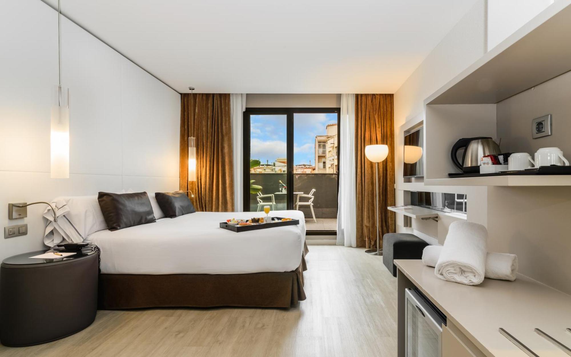 Este quarto com terraço urbano inclui 1 acesso ao spa por pessoa, por estadia.