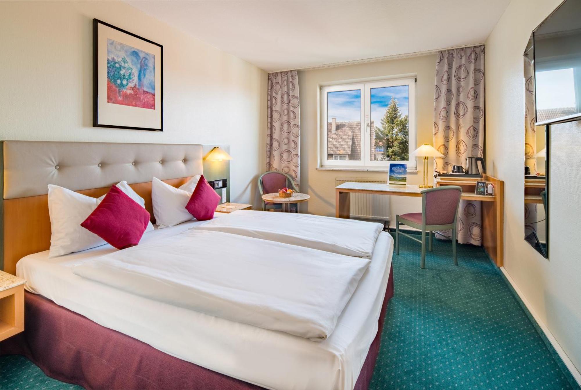 Comfort Zimmer mit Queensize-Bett und Aussicht