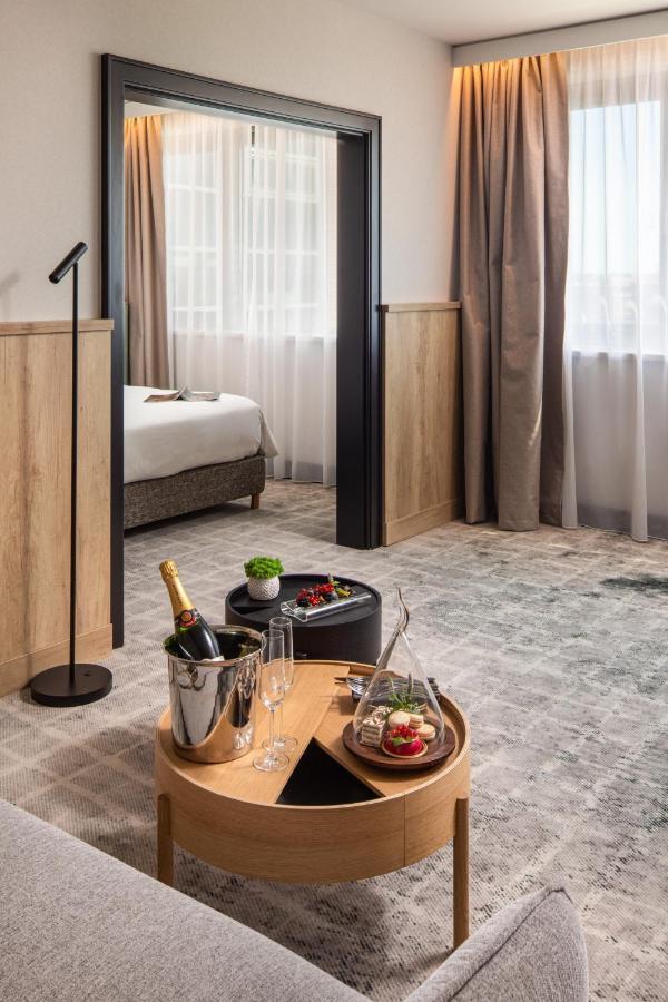 Junior Suite mit Kingsize-Bett und Sitzbereich