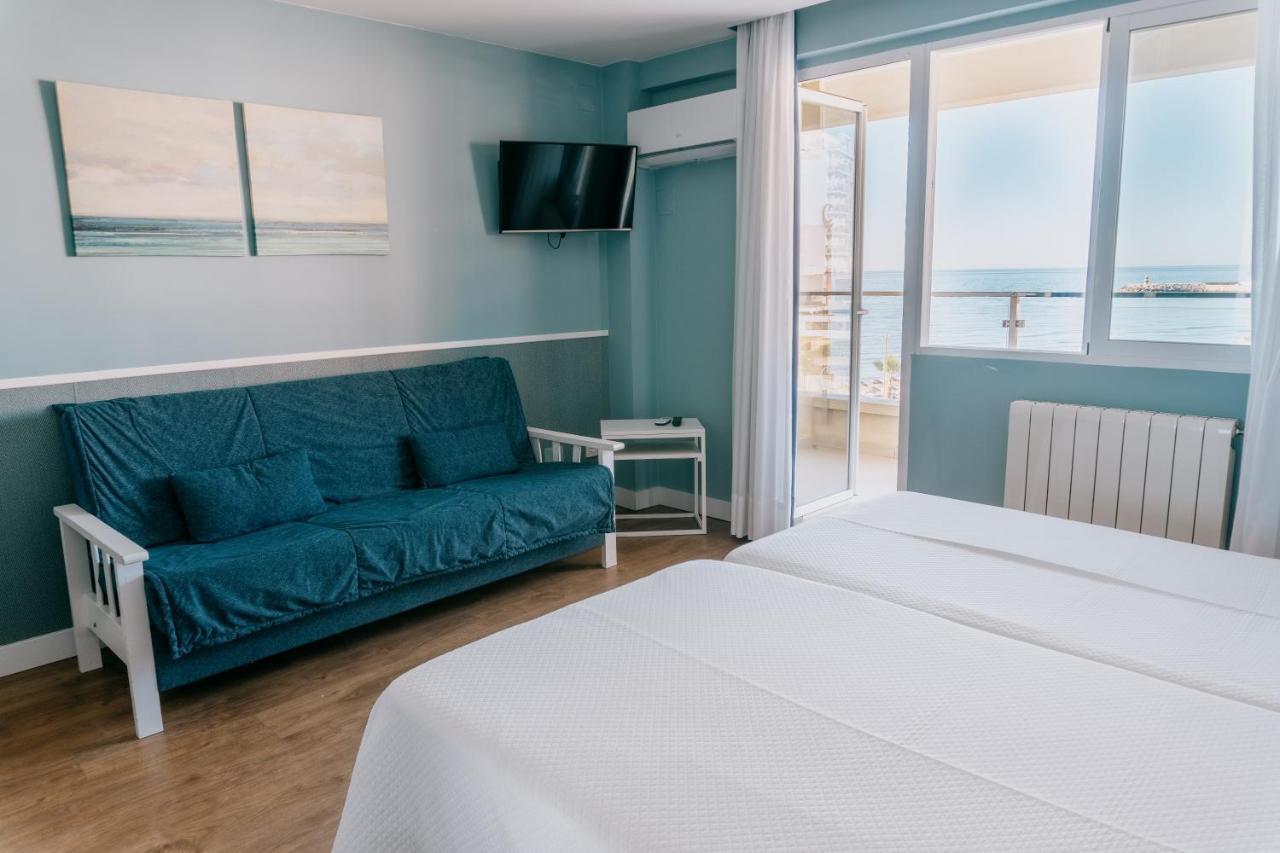 Quarto Triplo com Vista Piscina