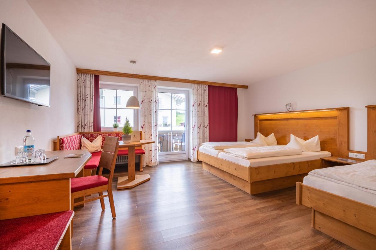 Dreibettzimmer mit Balkon