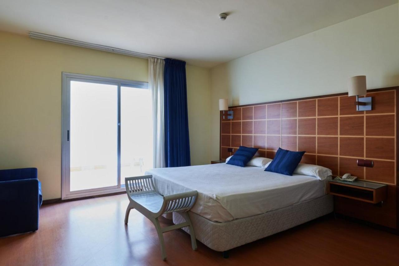 Habitación Triple con balcón