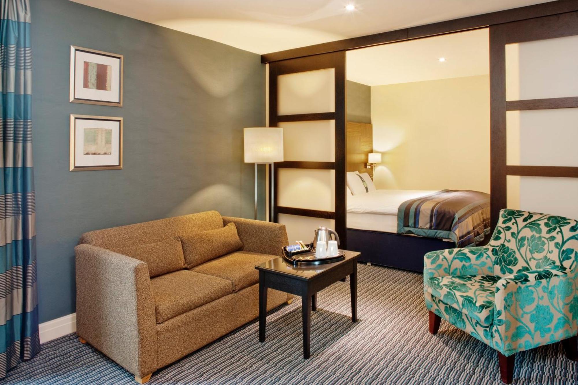 Suite met 1 Slaapkamer en een Slaapbank