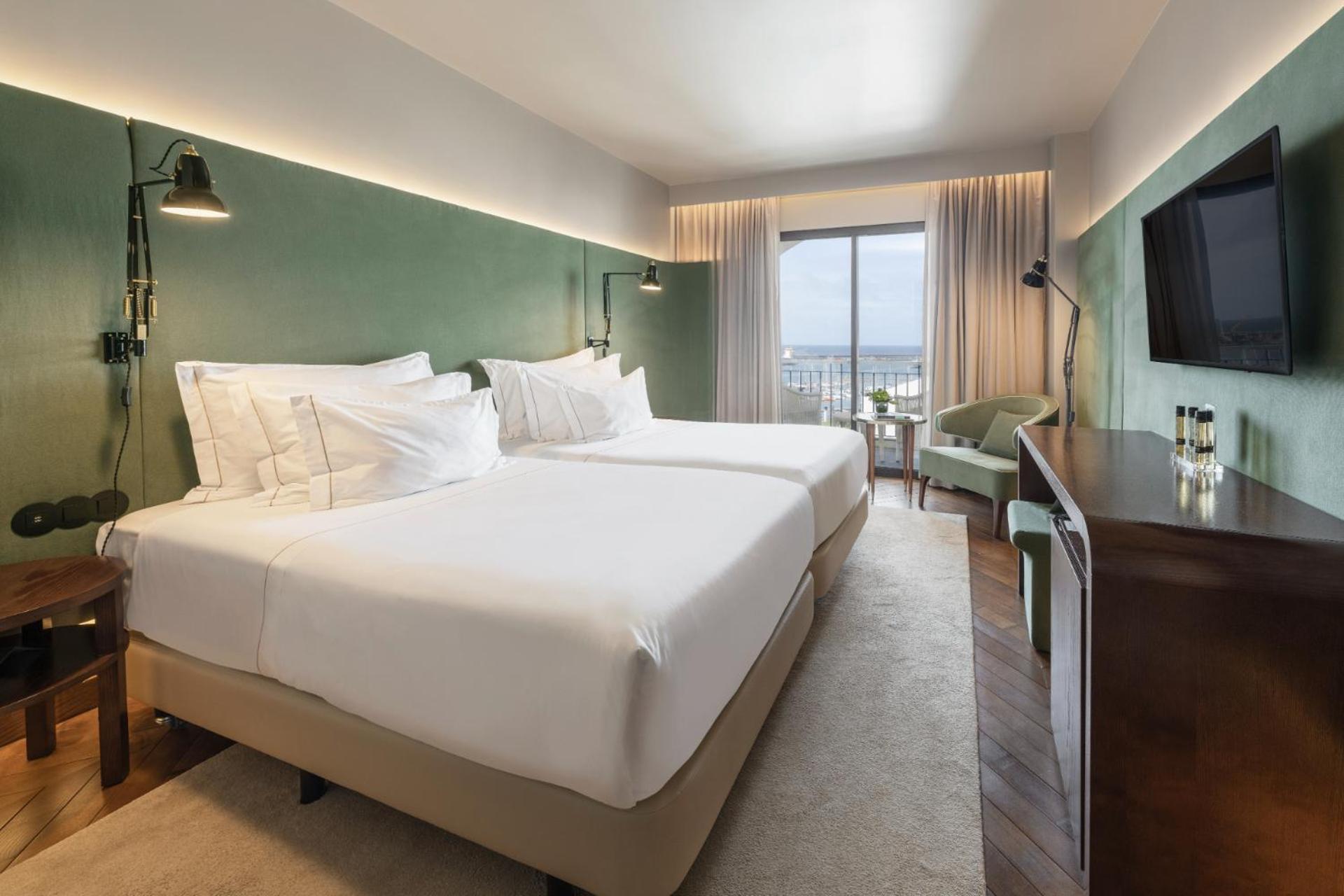 Doppel- oder Zweibettzimmer mit Blick auf die Bucht