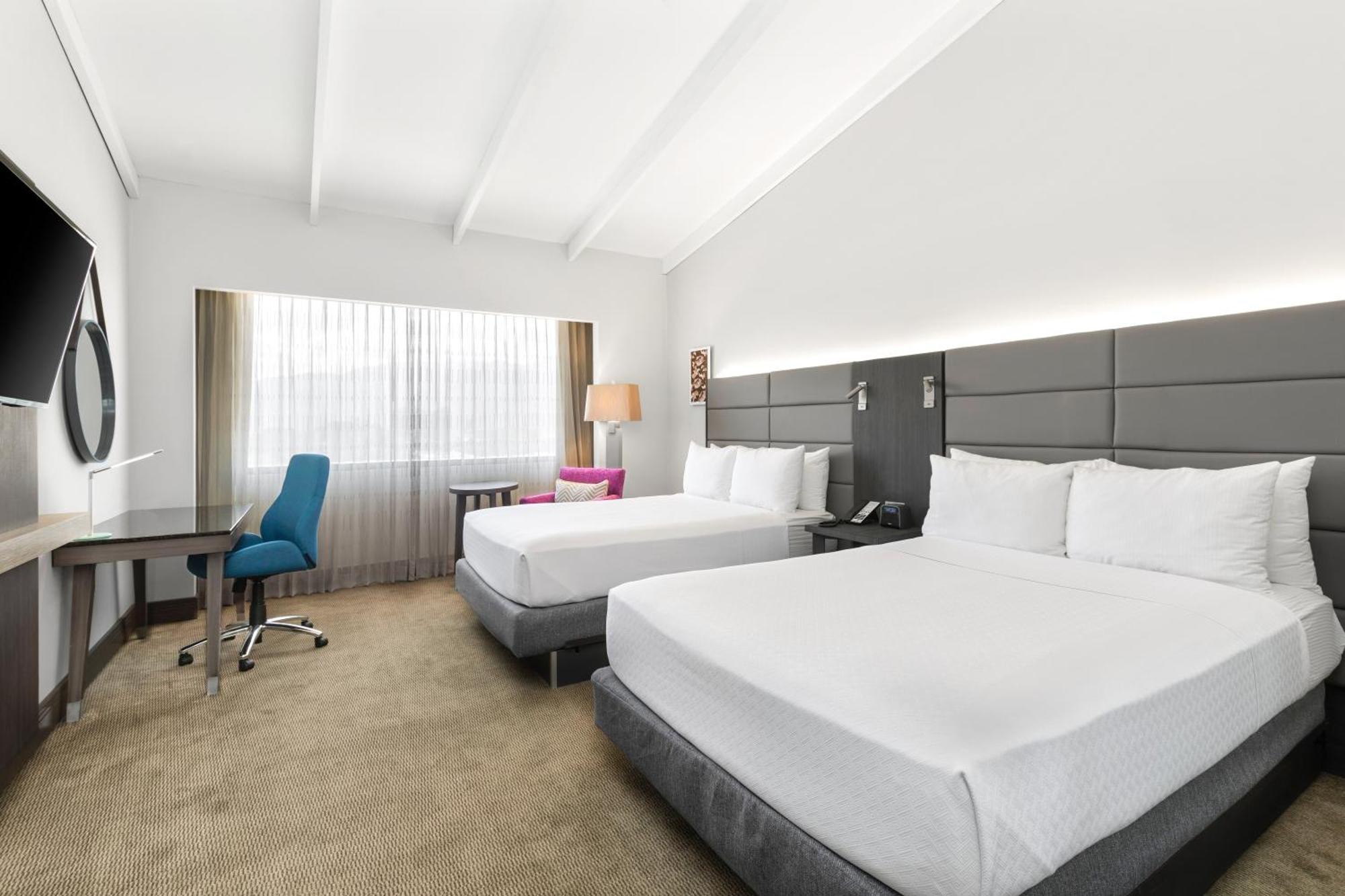 Habitación Doble Estándar con acceso al salón - 2 camas dobles - Planta Club