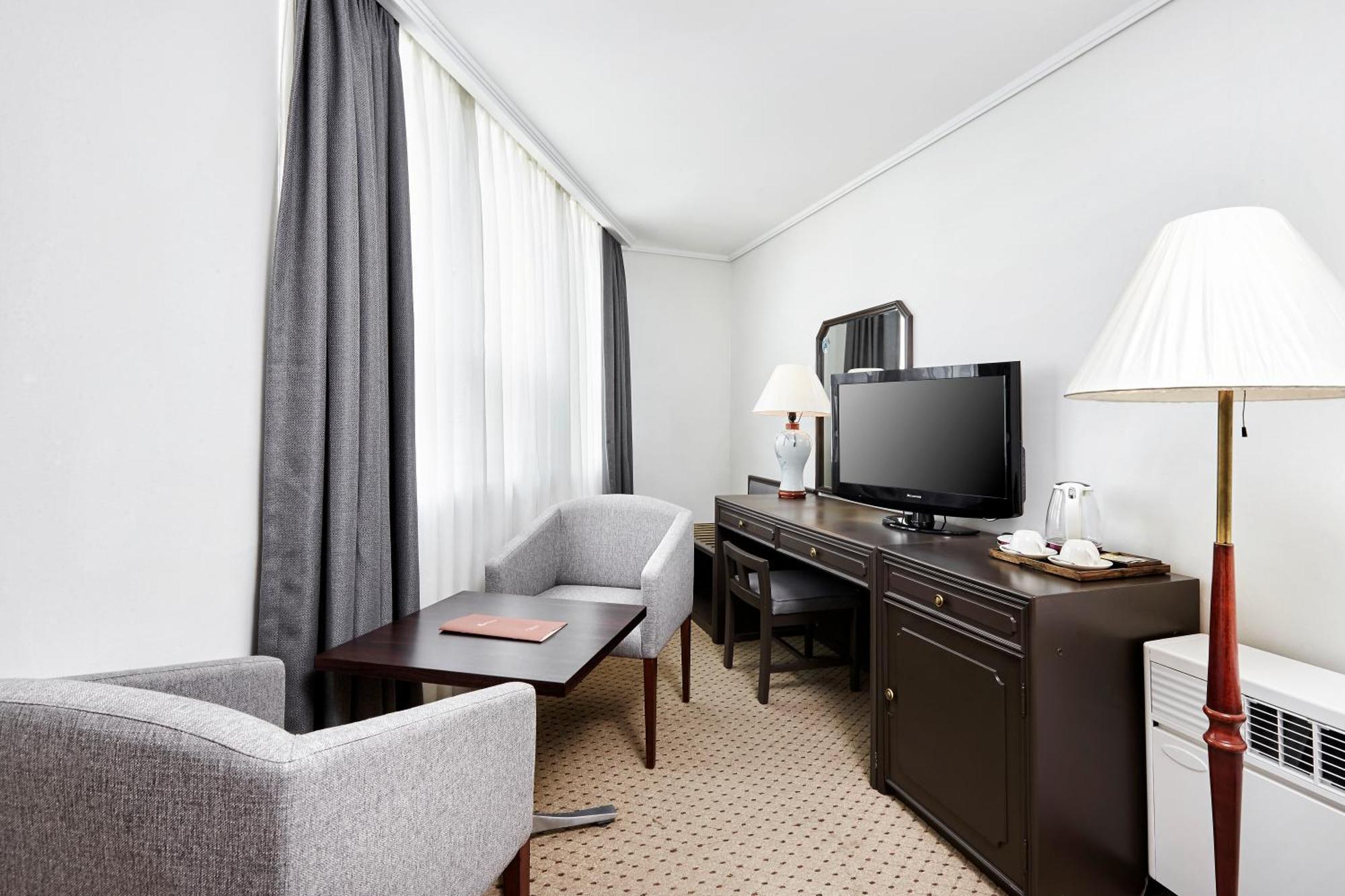 Eckzimmer mit Einzelbett