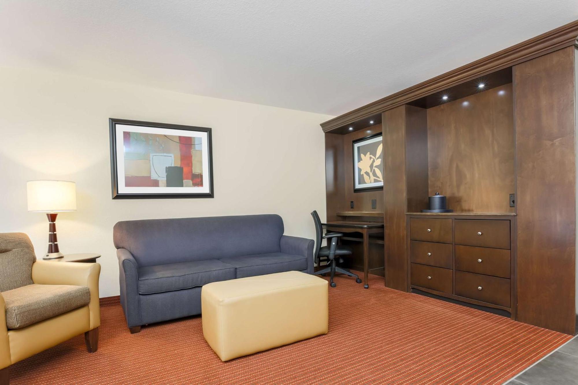 Deluxe Queen Room with Two Queen Beds and Sofa Bed