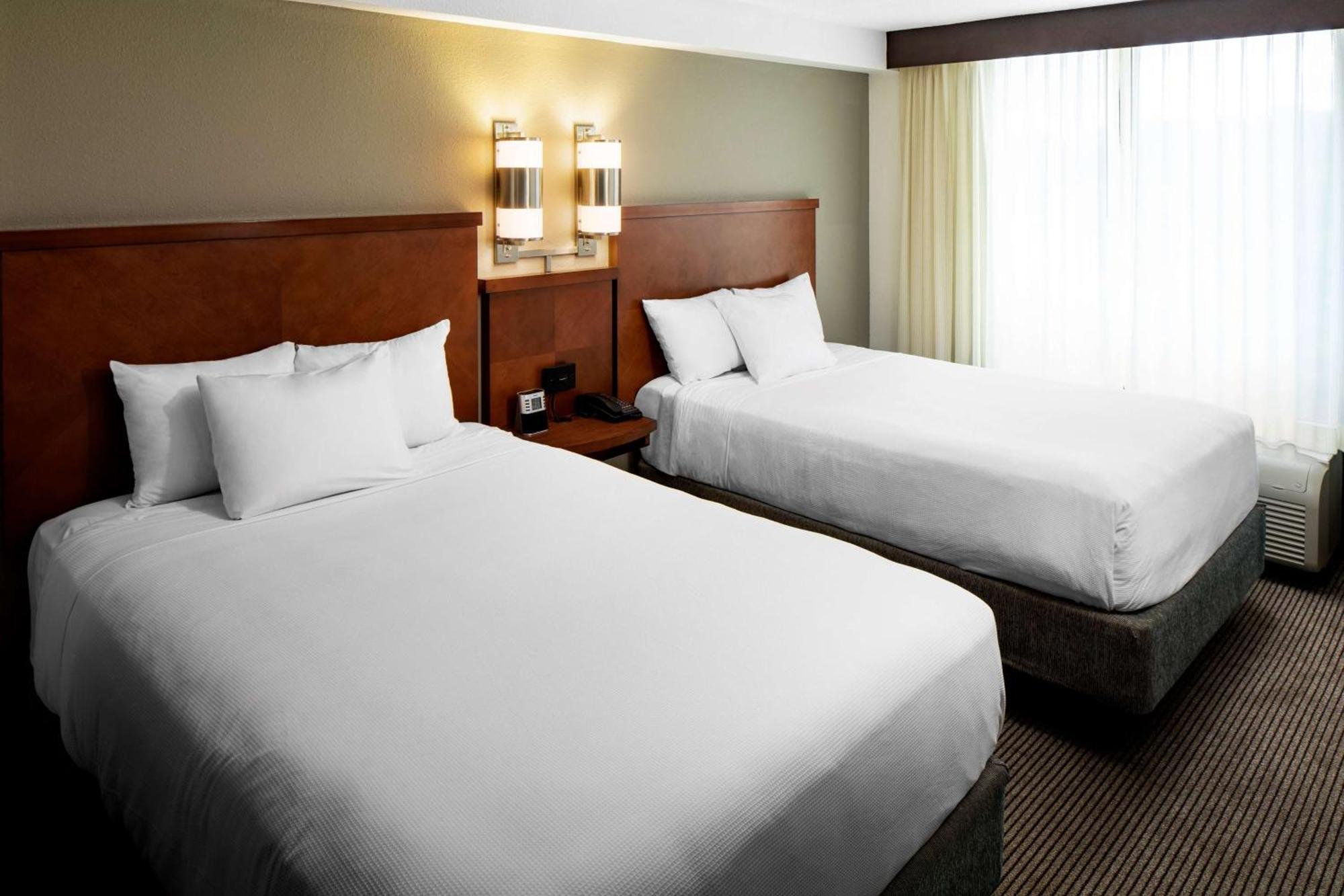 Queen Room with Two Queen Beds and Sofa Bed - High Floor