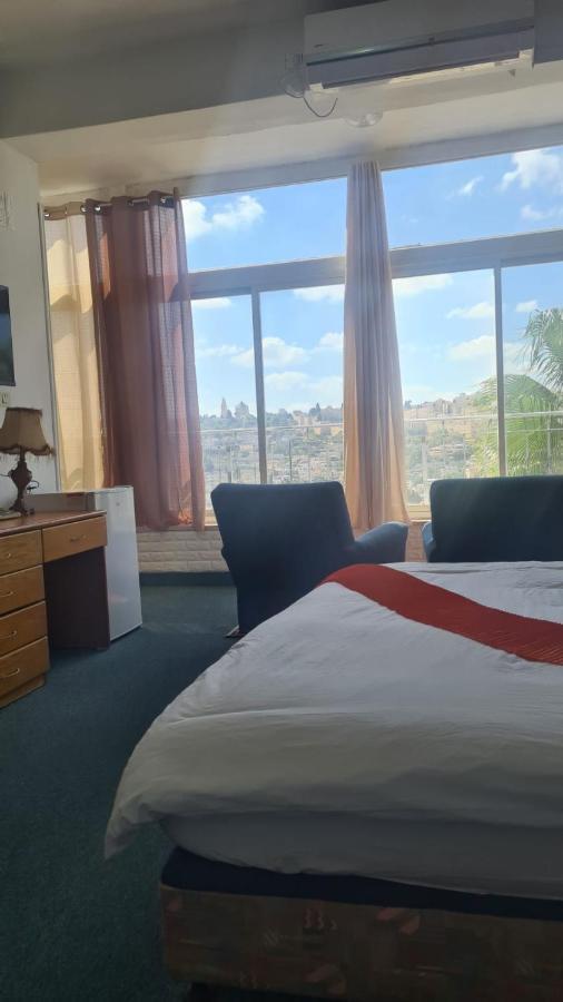 Quarto Quádruplo com Vista da Montanha