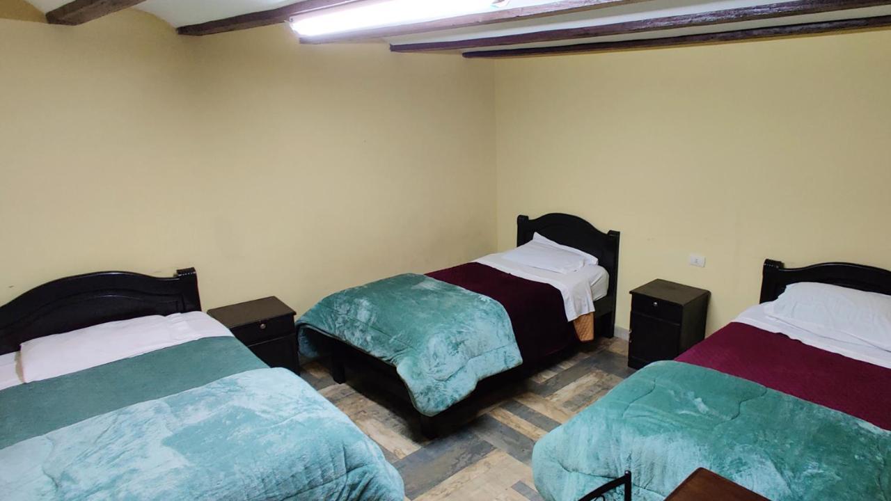 Habitación Triple Básica con baño compartido