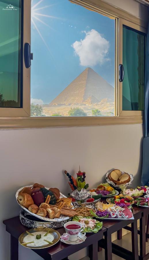 Quarto Deluxe com Cama de Casal ou 2 de Solteiro e Vista das Pirâmides