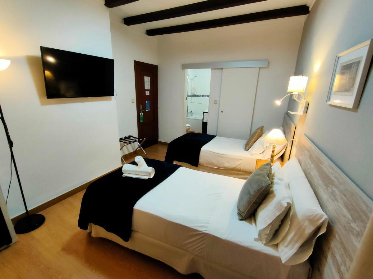 Interieur Economy Tweepersoonskamer met 2 Aparte Bedden
