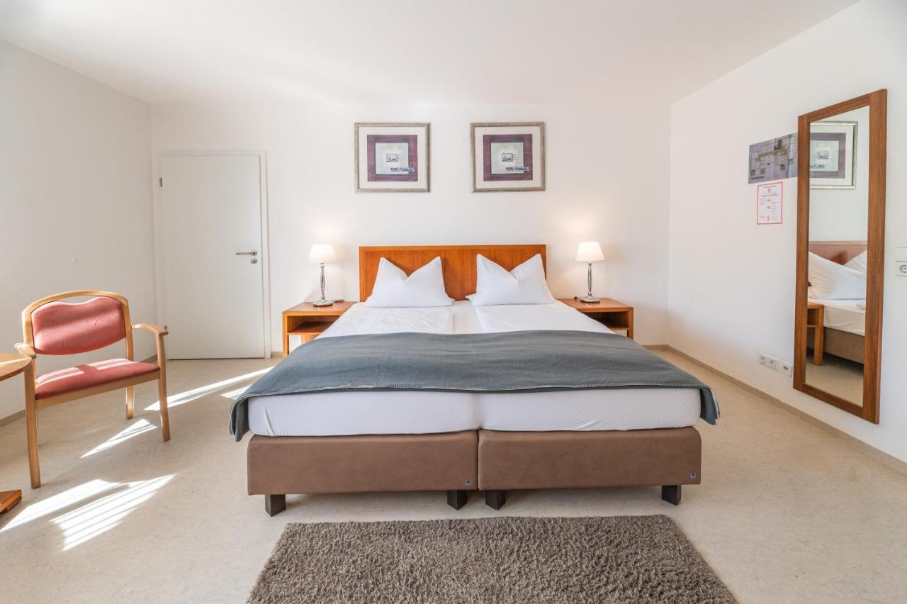 Doppel- oder Zweibettzimmer