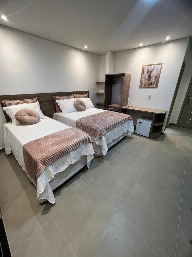 Quarto Triplo com Varanda