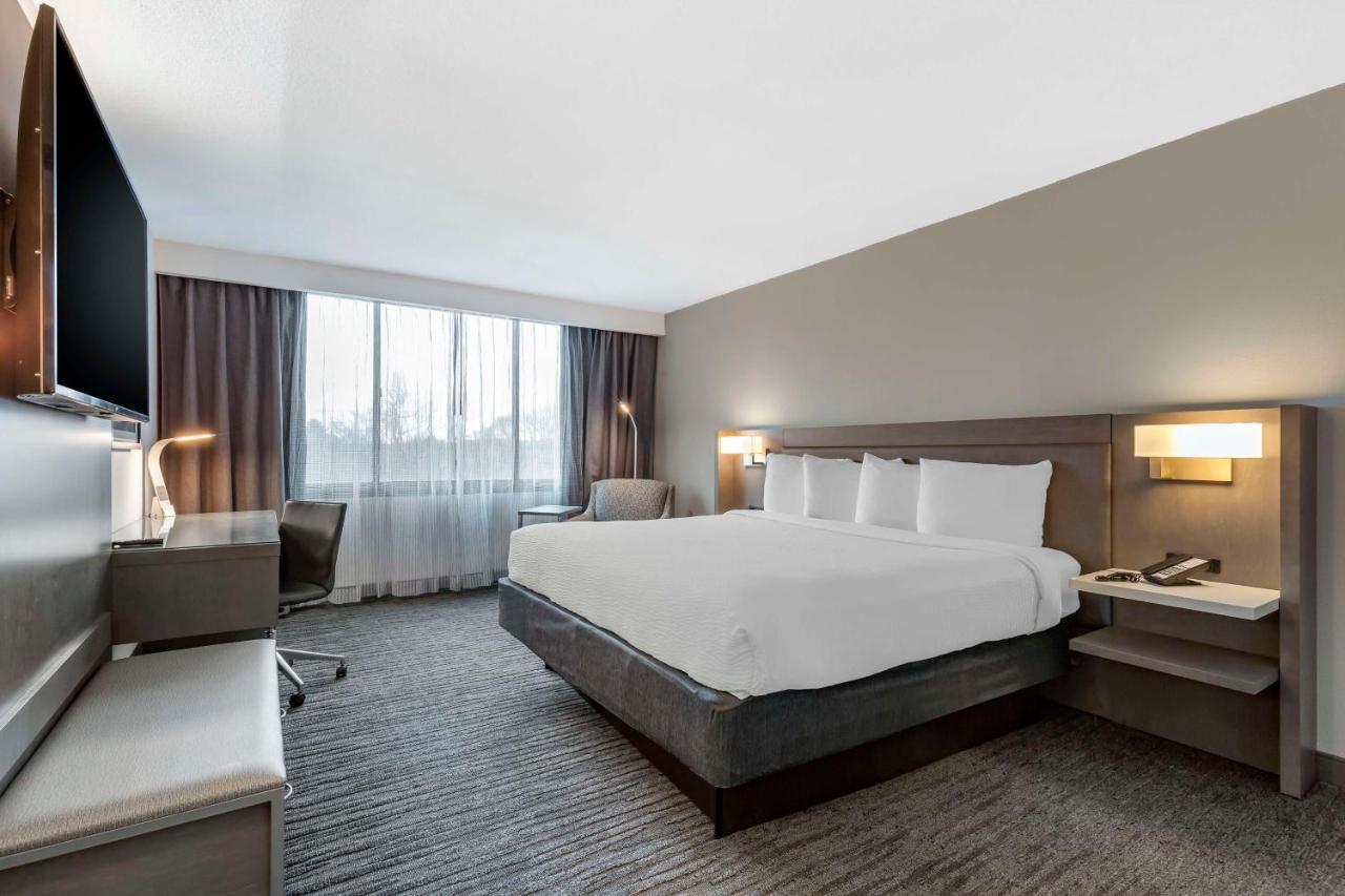 Two-Room King Suite with Roll-In Shower and Sofa Bed - Disability/Non-Smoking