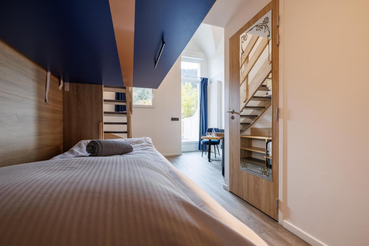 Suite Familiale en Duplex avec Terrasse - Accès au Spa Inclus