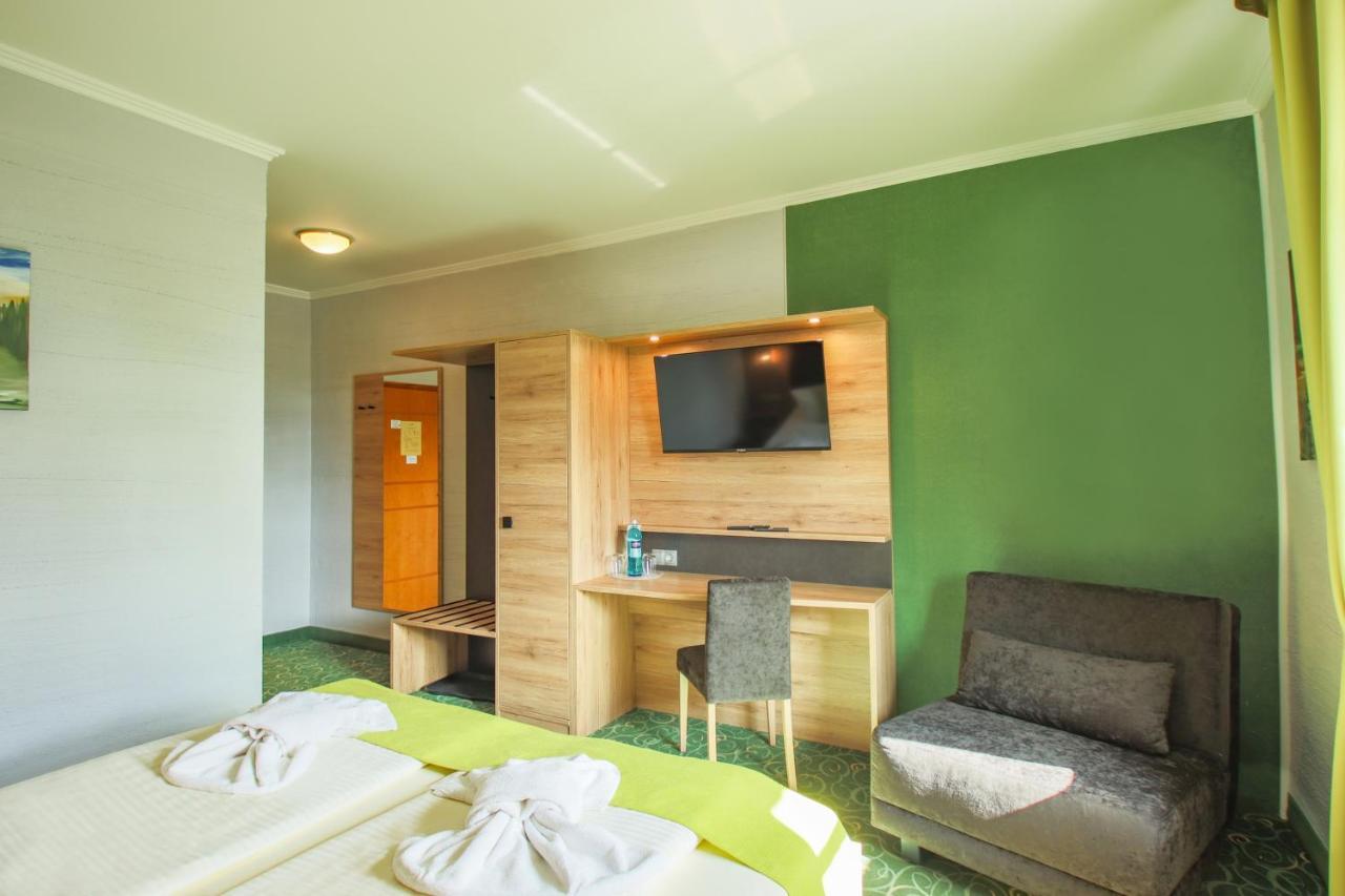 Doppelzimmer (1 Erwachsener + 1 Kind)