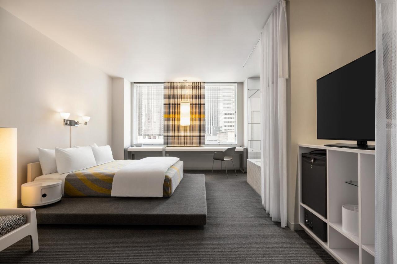 Hébergement Lit King-Size Premium