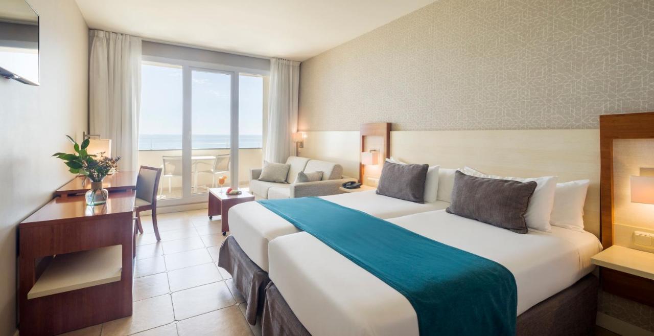 Triple Room with Sea View (2 Adults + 1 Child)