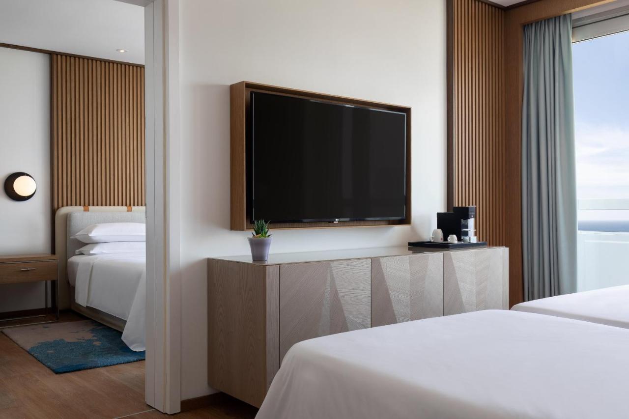 Deluxe Kamer met Queensize Bed en een Balkon - Uitzicht op Zee