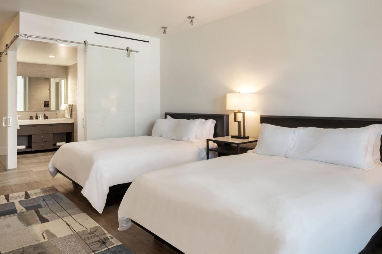 Queen Room with Two Queen Beds with Balcony and City View
