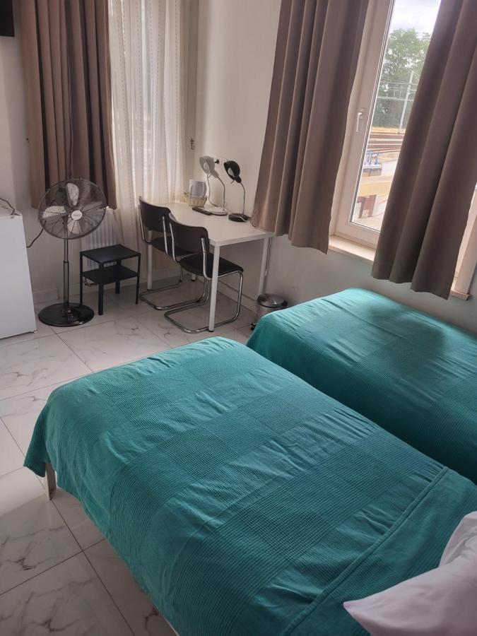 Tweepersoonskamer met 2 Aparte Bedden