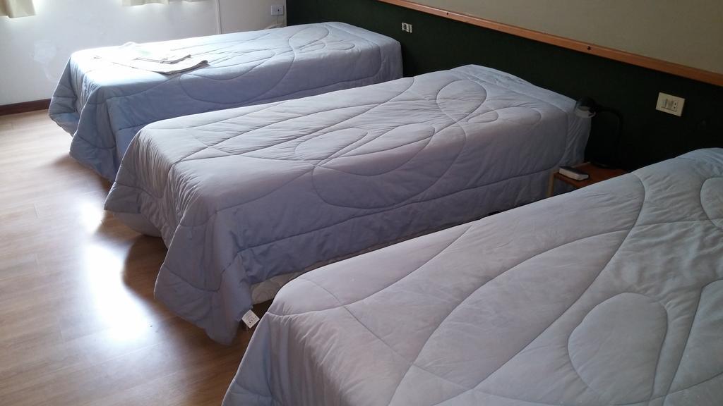 Quarto Triplo Standard com 3 Camas de Solteiro