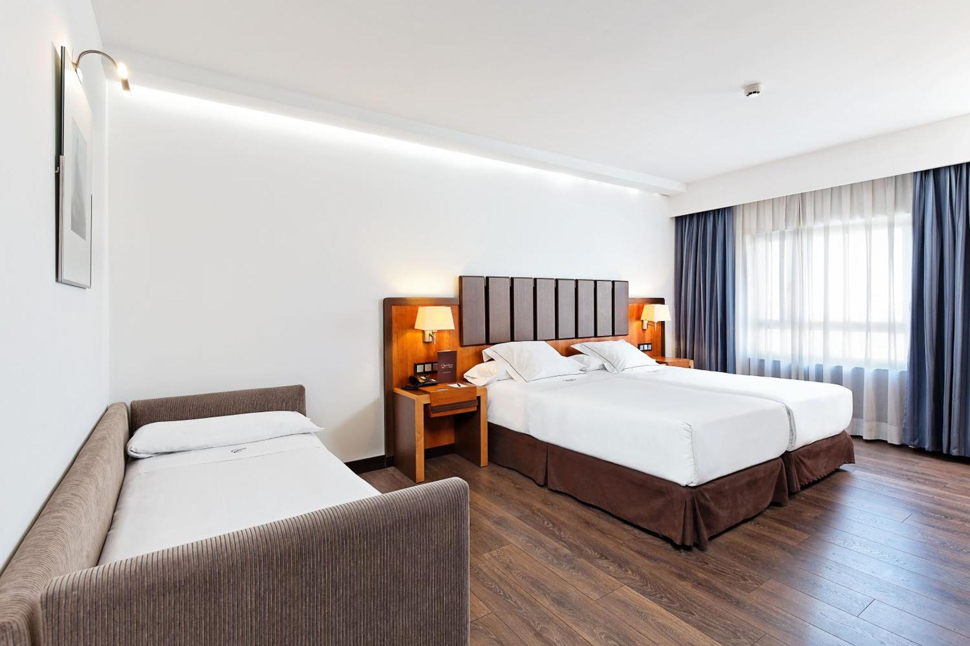 Dreibettzimmer (2 Erwachsene + 1 Kind)