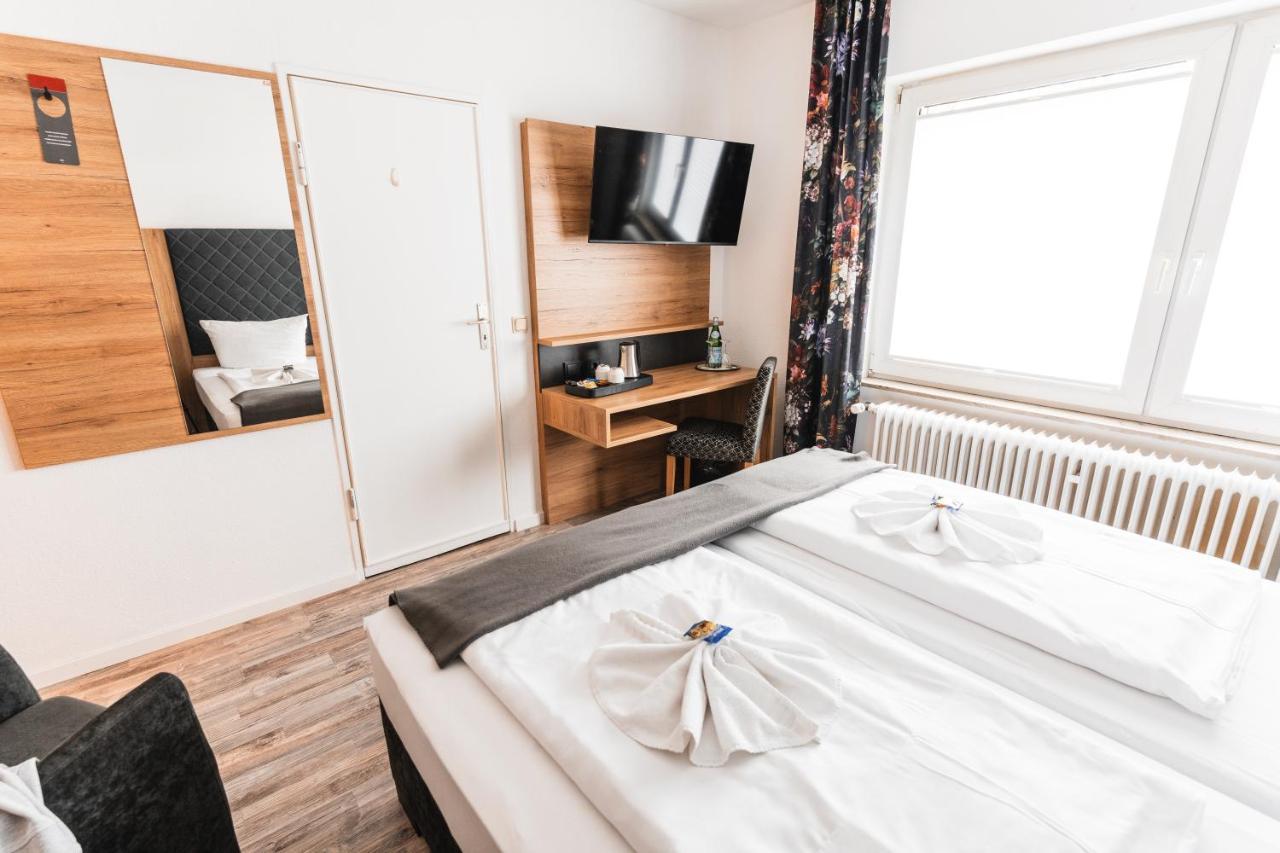 Doppel- oder Zweibettzimmer