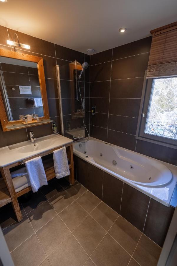 Chambre Lit King-Size avec Baignoire Spa