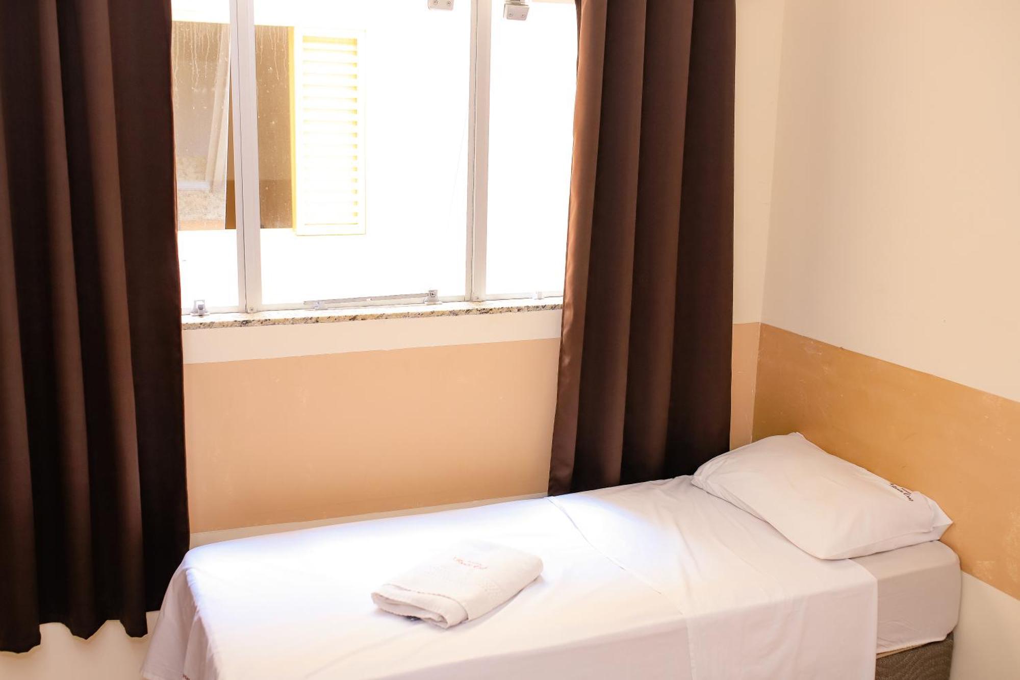 Quarto Triplo com Banheiro Privativo
