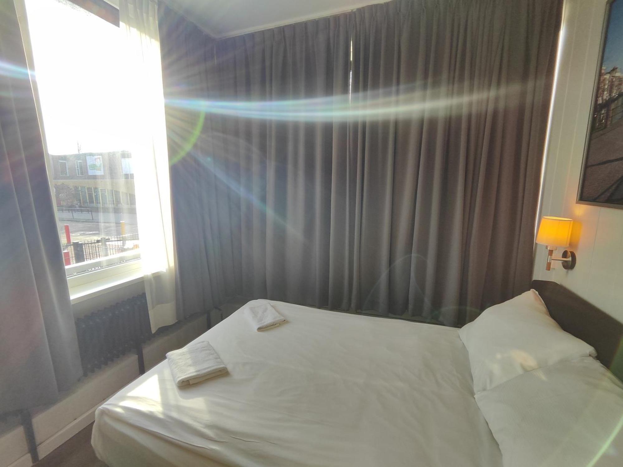 Economy Doppelzimmer mit Gemeinschaftsbad und -WC