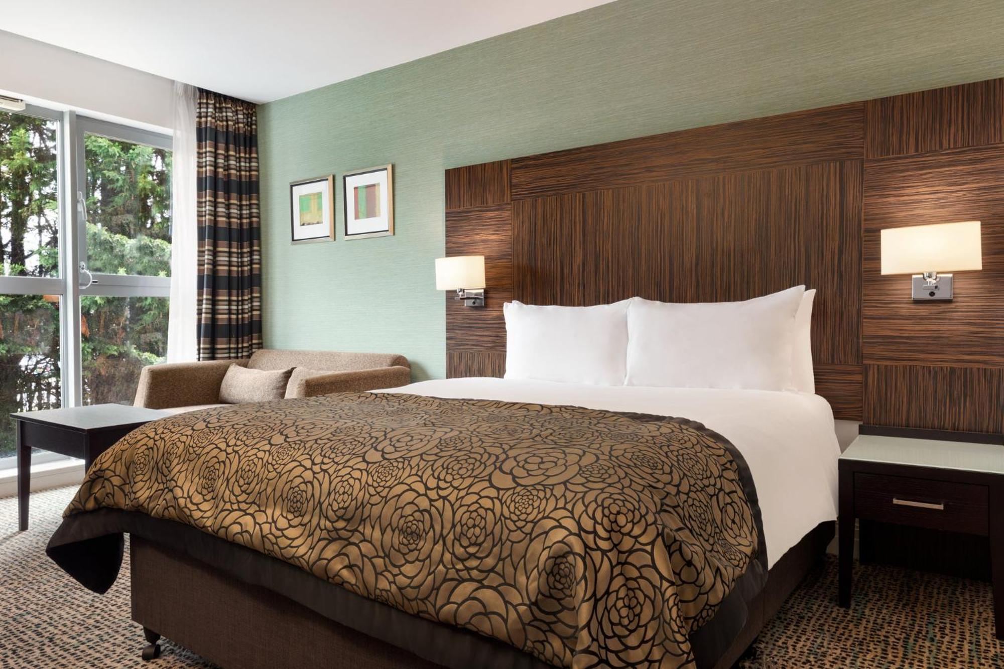 Premium Kamer met 1 Queensize Bed - Slaapbank