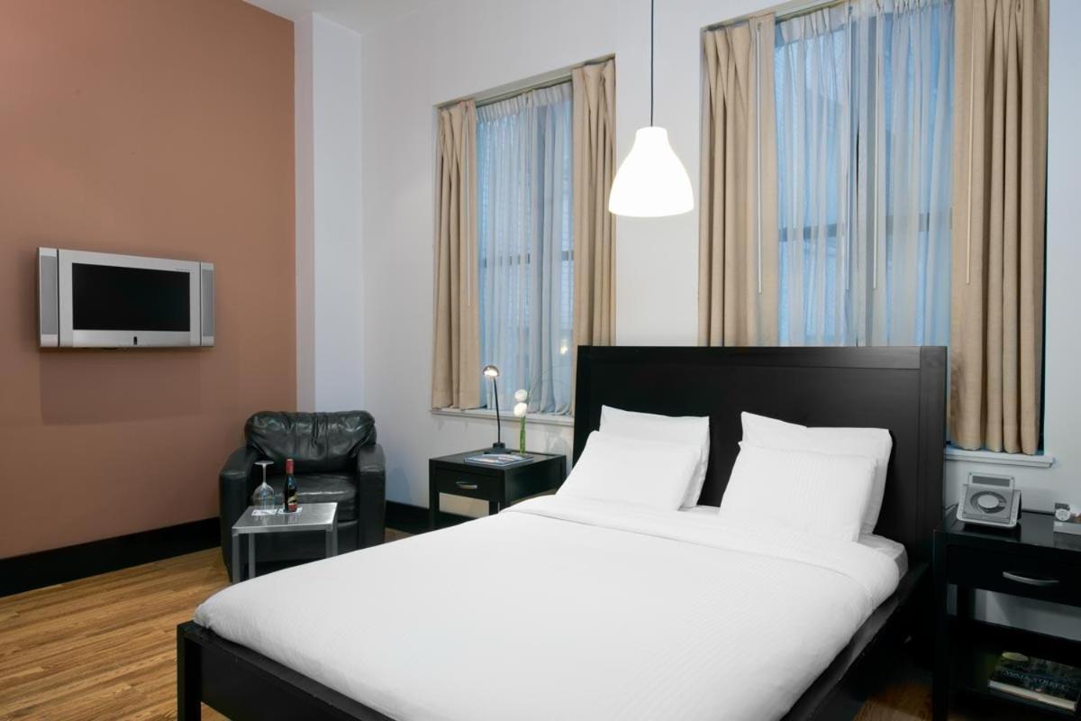 Quarto com Cama Queen-size