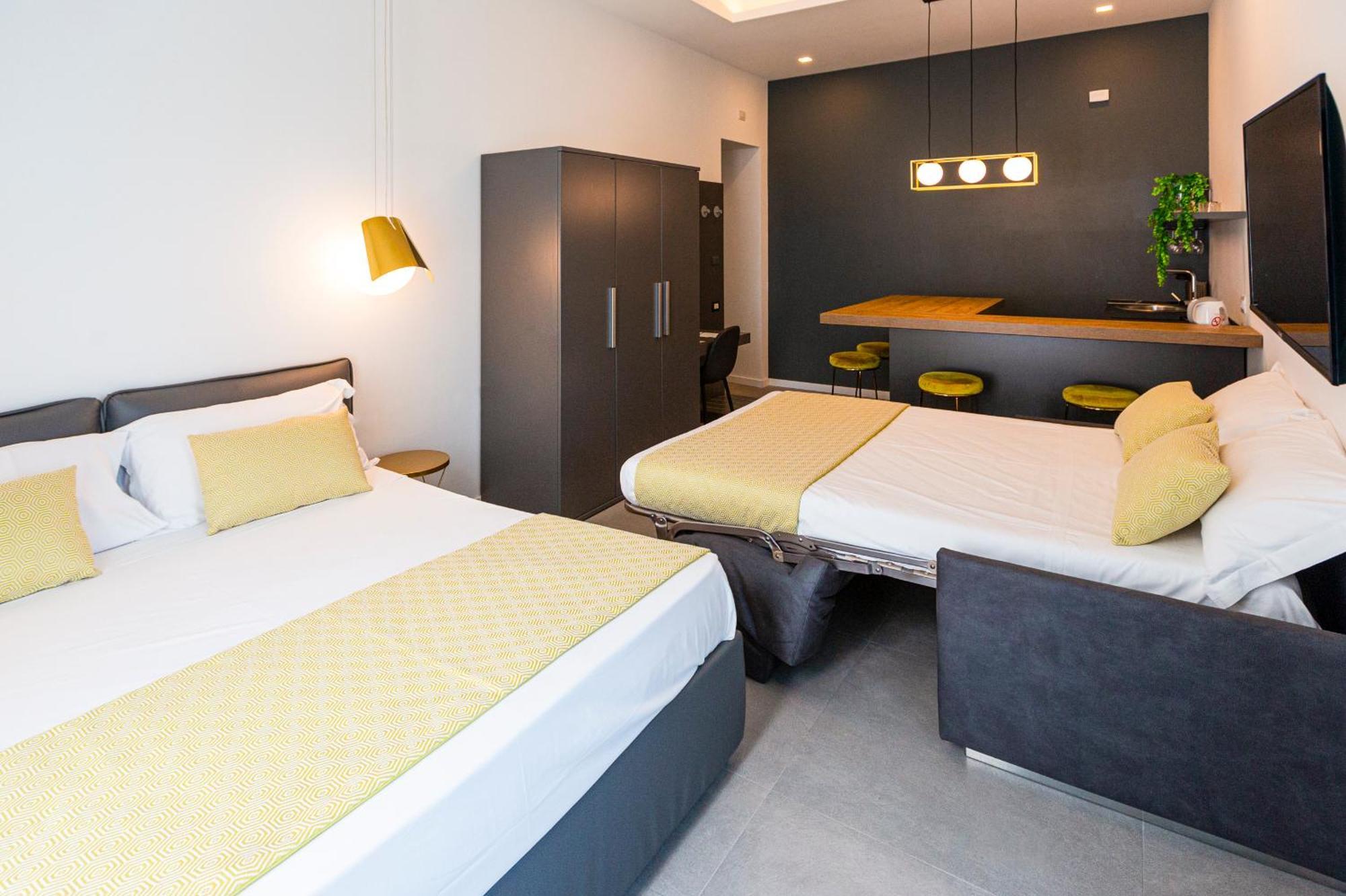 Suite met Kingsize Bed en Uitzicht op Zee